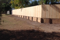 Timber paling fencing on retaining wall - RD-W36